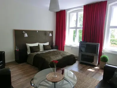 Ein Bett oder Betten in einem Zimmer der Unterkunft Apartment KiezFlair