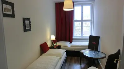Ein Bett oder Betten in einem Zimmer der Unterkunft Apartment KiezFlair