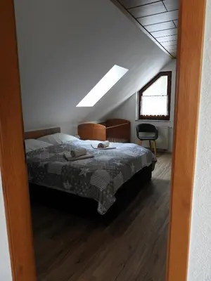 Ein Bett oder Betten in einem Zimmer der Unterkunft Auf der Heide - Ferienhaus für 6 Personen