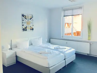 Ein Bett oder Betten in einem Zimmer der Unterkunft BNB Potsdamer Platz - Rooms & Apartments