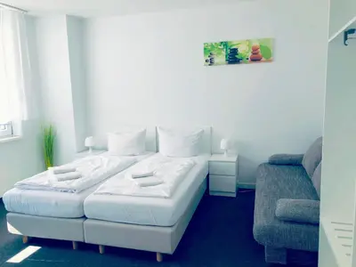 Ein Bett oder Betten in einem Zimmer der Unterkunft BNB Potsdamer Platz - Rooms & Apartments