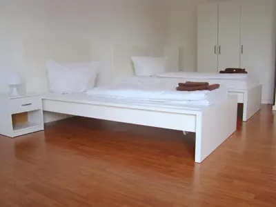 Ein Bett oder Betten in einem Zimmer der Unterkunft BNB Potsdamer Platz - Rooms & Apartments