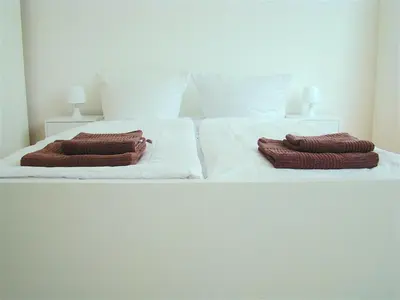 Ein Bett oder Betten in einem Zimmer der Unterkunft BNB Potsdamer Platz - Rooms & Apartments