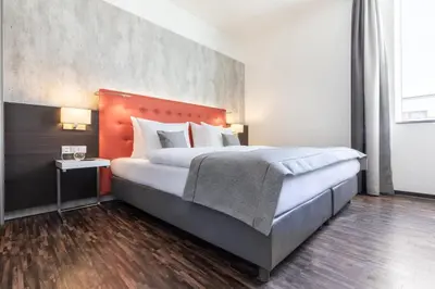 Ein Bett oder Betten in einem Zimmer der Unterkunft Garner Hotel Berlin - Mitte by IHG