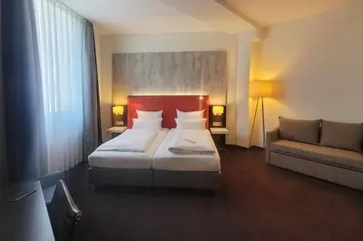 Ein Bett oder Betten in einem Zimmer der Unterkunft Garner Hotel Berlin - Mitte by IHG