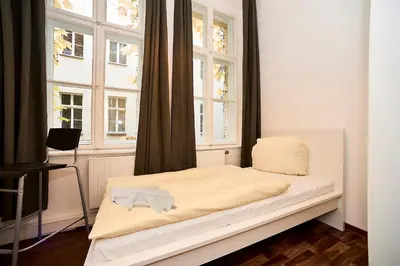 Ein Bett oder Betten in einem Zimmer der Unterkunft Bearlin City Apartments - City Center East