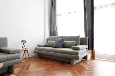Ein Sitzbereich in der Unterkunft KATZ by ROCKCHAIR Apartments l SUPERHOST Status l 3 Bedrooms Boxspringbeds 2 Bathrooms in City Center - Cozy Family & Business Flair welcomes you!