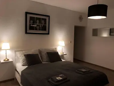 Ein Bett oder Betten in einem Zimmer der Unterkunft Landlust Hotel