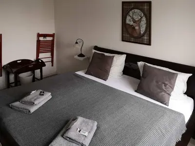 Ein Bett oder Betten in einem Zimmer der Unterkunft Landlust Hotel