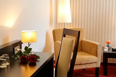Ein Sitzbereich in der Unterkunft Hotel Herbst Berlin