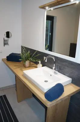 Ein Badezimmer in der Unterkunft BluGarden Ferienapartments im Spreewald