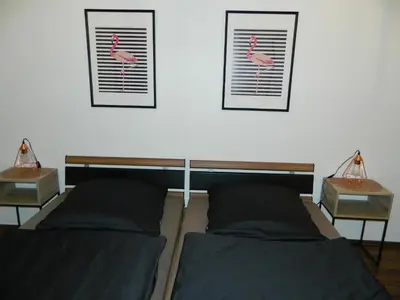 Ein Bett oder Betten in einem Zimmer der Unterkunft Unter den Linden