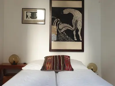 Ein Bett oder Betten in einem Zimmer der Unterkunft Apartment center Friedrichshain