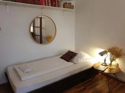 Ein Bett oder Betten in einem Zimmer der Unterkunft Apartment center Friedrichshain