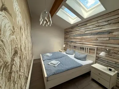 Ein Bett oder Betten in einem Zimmer der Unterkunft Ferien am See