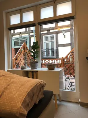 Ein Bett oder Betten in einem Zimmer der Unterkunft Studioapartment G16 - in exklusiver Innenstadtlage