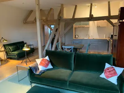 Ein Sitzbereich in der Unterkunft Kranichhof - Studio, Loft & Atelier