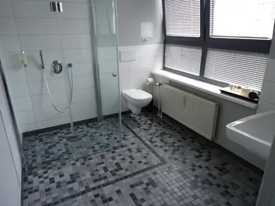 Ein Badezimmer in der Unterkunft Hotel Arena Inn - Berlin Mitte
