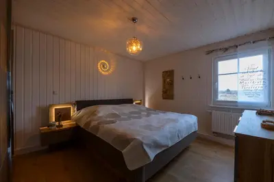 Ein Bett oder Betten in einem Zimmer der Unterkunft Haus Michel