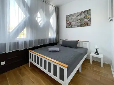 Ein Bett oder Betten in einem Zimmer der Unterkunft Schwanenburg Apartments