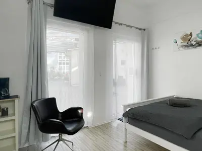 Ein Bett oder Betten in einem Zimmer der Unterkunft Schwanenburg Apartments