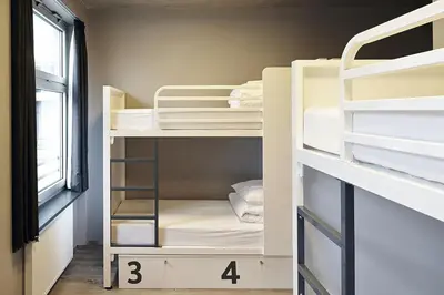 Ein Bett oder Betten in einem Zimmer der Unterkunft Generator Berlin Mitte
