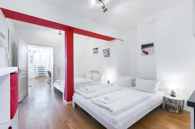 Ein Bett oder Betten in einem Zimmer der Unterkunft DR APARTMENTS