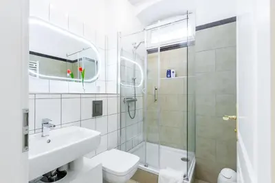 Ein Badezimmer in der Unterkunft DR APARTMENTS