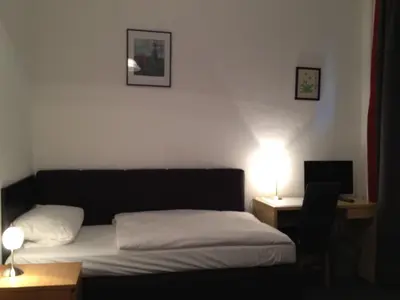 Ein Bett oder Betten in einem Zimmer der Unterkunft Hotel-Pension Dorma