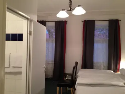 Ein Bett oder Betten in einem Zimmer der Unterkunft Hotel-Pension Dorma