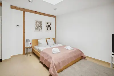 Ein Bett oder Betten in einem Zimmer der Unterkunft Arbio I Urban Apartment
