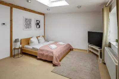 Ein Bett oder Betten in einem Zimmer der Unterkunft Arbio I Urban Apartment