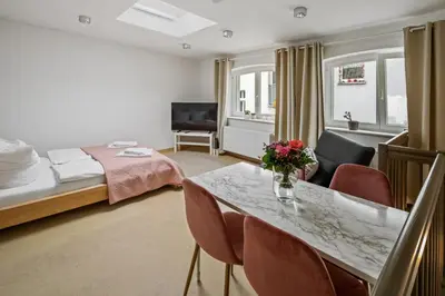 Ein Bett oder Betten in einem Zimmer der Unterkunft Arbio I Urban Apartment