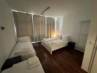 Ein Bett oder Betten in einem Zimmer der Unterkunft Potsdamer Inn