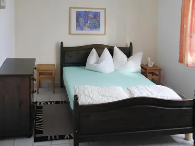 Ein Bett oder Betten in einem Zimmer der Unterkunft Bungalow , Teupitz