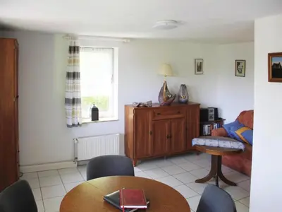 Ein Sitzbereich in der Unterkunft Bungalow , Teupitz