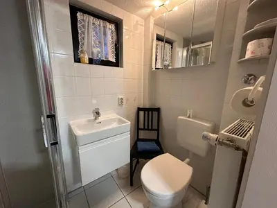 Ein Badezimmer in der Unterkunft Bungalow , Teupitz