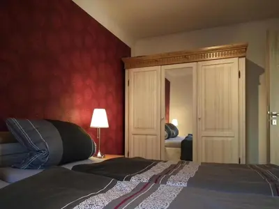 Ein Bett oder Betten in einem Zimmer der Unterkunft Ferienhaus Spreeidyll, Schlepzig