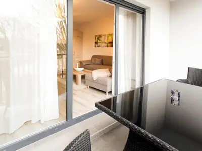 Ein Bett oder Betten in einem Zimmer der Unterkunft Appartements mit Blick auf die Spree in Lübben