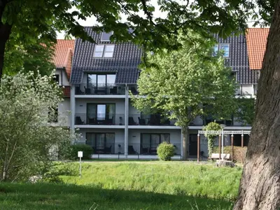 Ein Garten an der Unterkunft Appartements mit Blick auf die Spree in Lübben