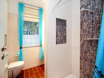 Ein Badezimmer in der Unterkunft Ferienhaus in Kummersdorf bei Storkow