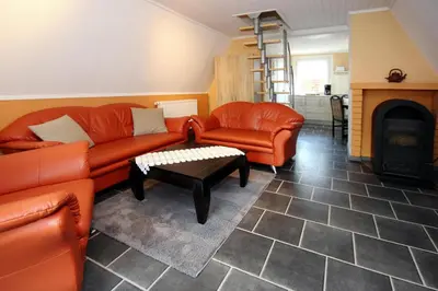 Ein Sitzbereich in der Unterkunft Ferienhaus Storchennest 2, Falkensee
