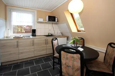 Küche/Küchenzeile in der Unterkunft Ferienhaus Storchennest 2, Falkensee