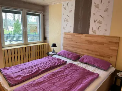 Ein Bett oder Betten in einem Zimmer der Unterkunft Ferienhaus Seeblick, Schönberg