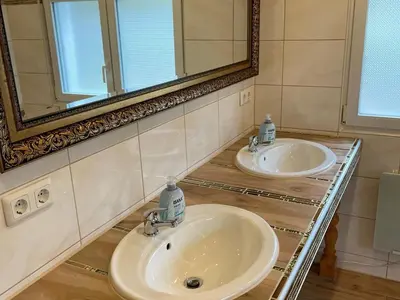 Ein Badezimmer in der Unterkunft Ferienhaus Seeblick, Schönberg