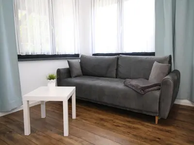 Ein Sitzbereich in der Unterkunft Holiday home, Luebben