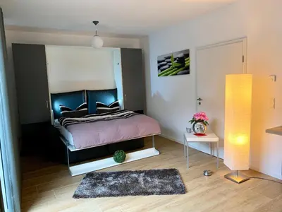 Ein Bett oder Betten in einem Zimmer der Unterkunft Townhouse Apartment Potsdam