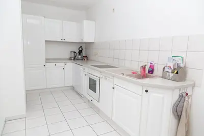 Küche/Küchenzeile in der Unterkunft Ferienwohnung BadSaarowZentrum