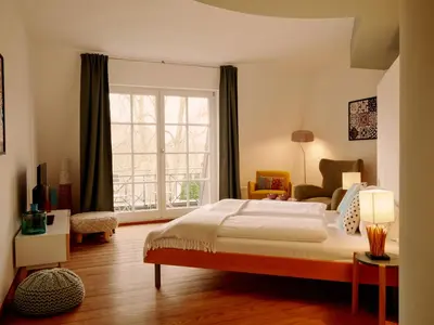 Ein Bett oder Betten in einem Zimmer der Unterkunft Seehotel Villago