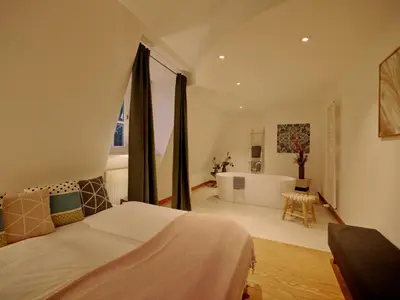 Ein Bett oder Betten in einem Zimmer der Unterkunft Seehotel Villago